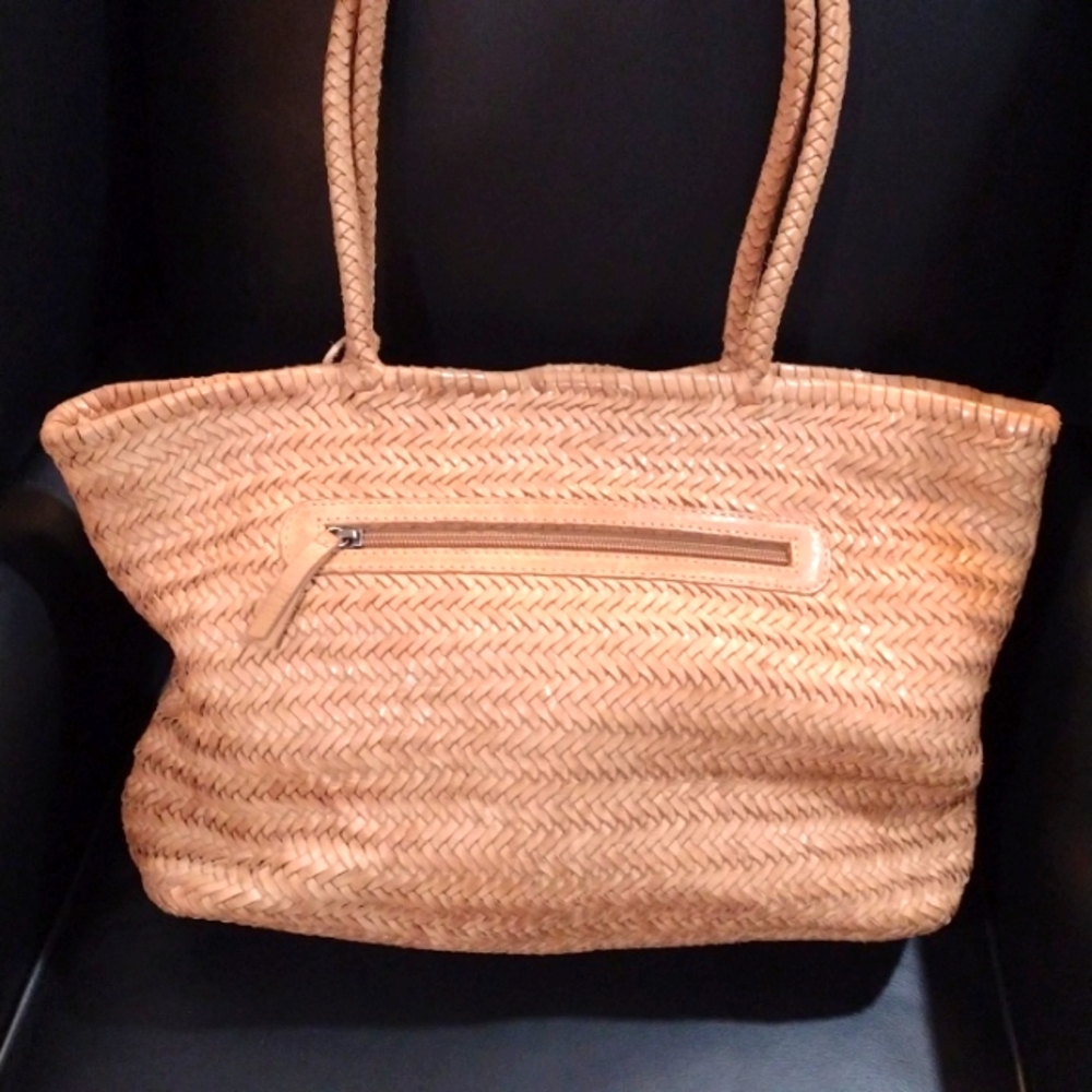 All leather woven purse/ tote. In English tan. This is a beautiful bag!